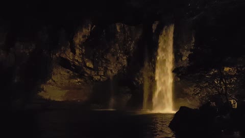 Waterfall at night with light