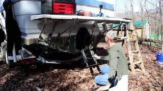 Removing the OMC Cobera outdrive on the 1989 Bayliner 2455 project boat