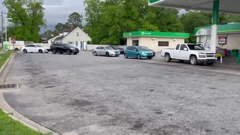 Cars Line up at a Rural Georgia Gas Station
