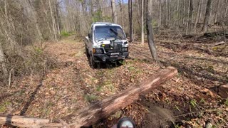 Minitruck clearing trails with winch