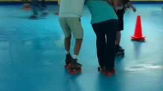 Senior Woman Takes A Tumble At The Roller Rink