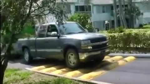 The truck goes over the speed bump to repair the truck transport