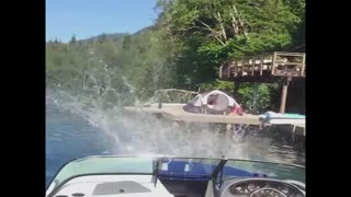 Boy falls off the roof and into the lake