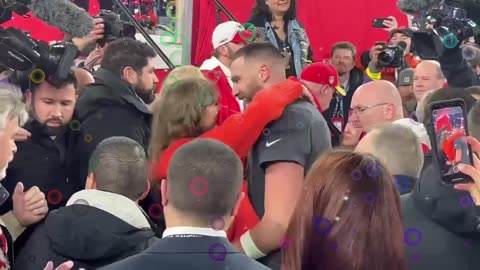 Taylor Swift and Travis Kelce exchanged passionate kisses on the field