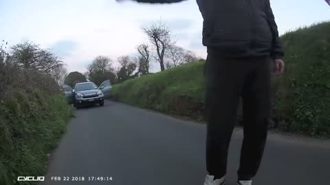 Cyclist Clipped by Car Door, Altercation Ensues