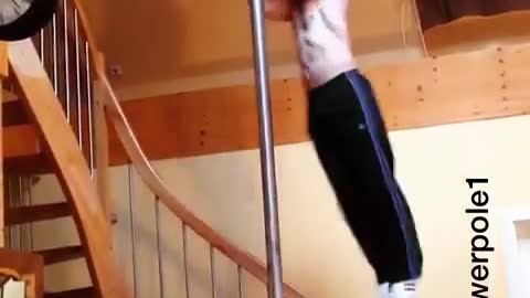 Muscle man pole dancing