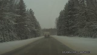 SUV Loses control and crashes into a truck