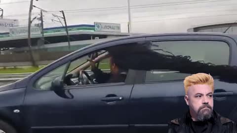 Rasta Man drying his hair on Dutch freeway