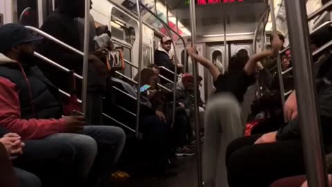 Boy curly hair sweat pants dancing in subway