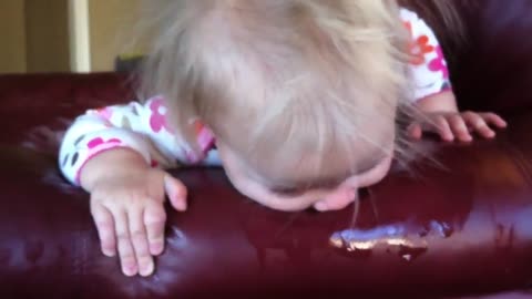 Baby Blowing Bubbles on the Couch!