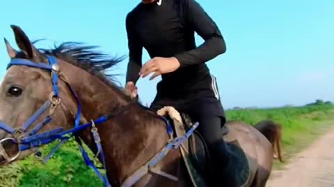 handsome man riding a horse