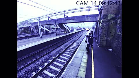 Woman Saves Man From Jumping In Front Of A Train