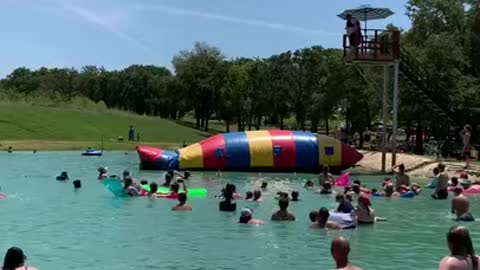 Kid gets launched into the sky from giant water inflatable