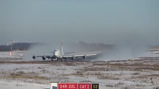 BOEING 747 DISAPPEARS IN ITS OWN SNOW CLOUD DURING DEPARTURE