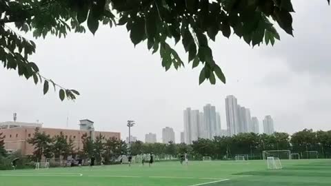 playing soccer on a rainy day in south korea