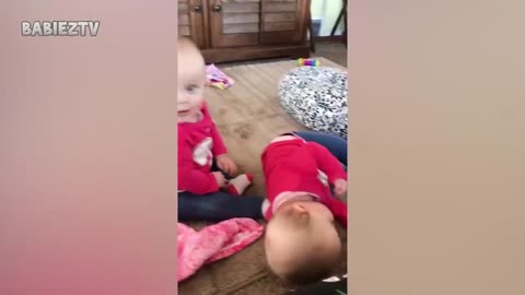 Twin Babies Playing Enough, Cute Twins Babies Having Fun