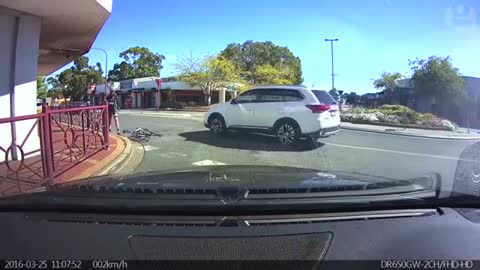 Dashcam captures cyclist being hit by car after passing on the inside