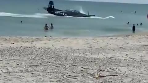 A World War II-era aircraft crash landed in the ocean at Cocoa Beach Air Show in Florida.