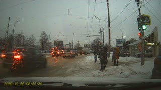 Pedestrian Crossing Street Struck by Passing Car