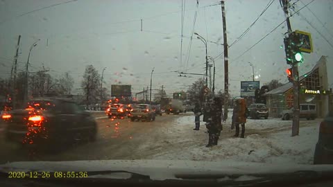 Pedestrian Crossing Street Struck by Passing Car