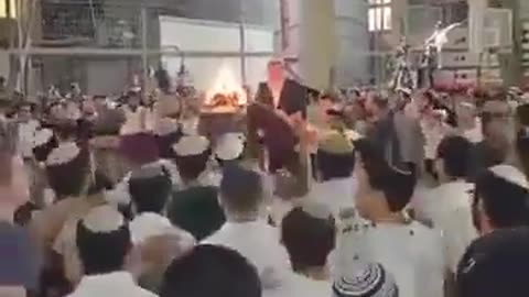 Footage published by settlers shows them dancing and celebrating