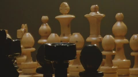Wooden chess board with an overhead light