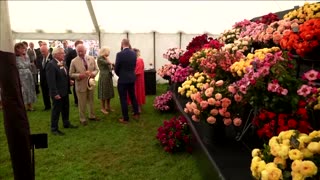 King Charles visits annual flower show with Camilla