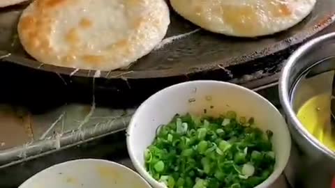 This skillful technique, fragrant green onion cake