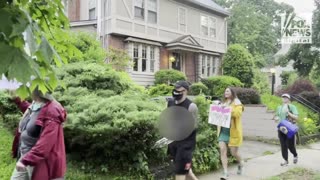 Protestors march and drum outside Kavanaugh's house