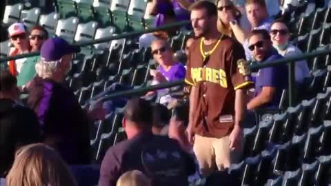 San Diego Padres fan knocks out Rockies fan