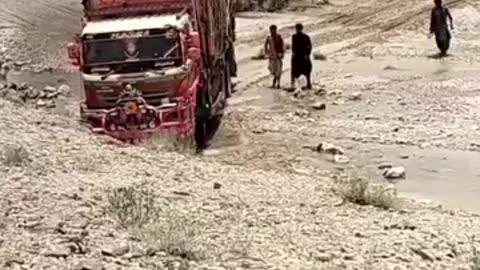 Heavy Trucks crossing kacha roar at Balochistan Pakistan