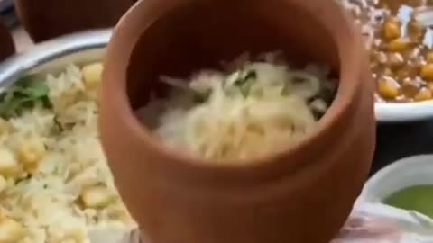 FOOD FILLED IN CUP IN INDIAN STREET FOOD
