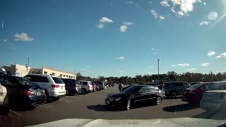 Two Vehicles Backing Out of Parking Spots Collide