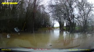 Dad Discovers Flooded Road is Deeper than It Seems