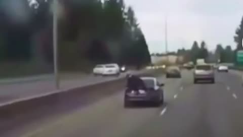 distracted motorcyclist takes a car ride