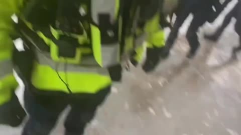 Police harassing the woman
