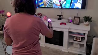 Woman Struggles Playing VR Game