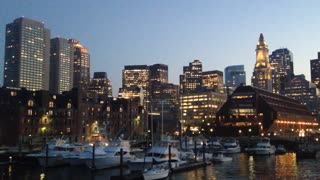 Boston At Night Viewed From Boat