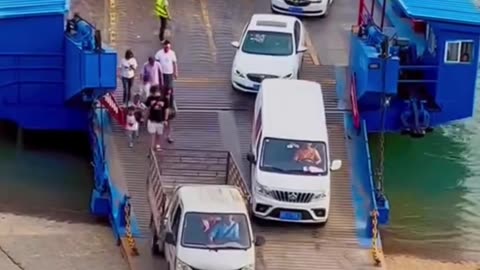 Ship unloading car bike an trucks