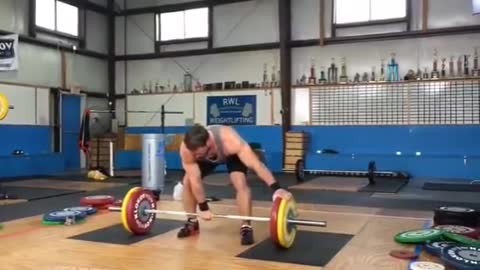 Dmitry Klokov one arm 220 lbs) (100 kg) snatch