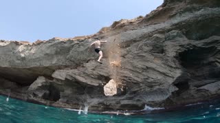 Cliff Breaks off Under Divers Feet