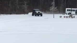 Jeep playing in the snow