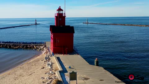Stunning winter drone footage of Holland Harbor Lighthouse in Michigan