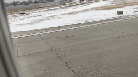 Takeoff from Chicago airport over snow