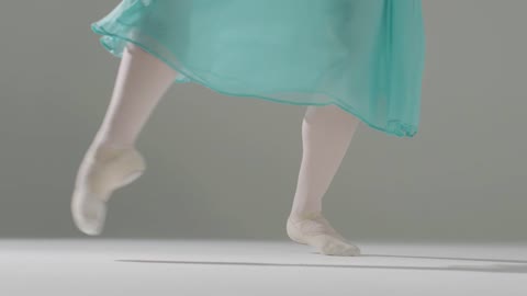 Low Shot of Ballet Dancers Feet Dancing Out of Frame