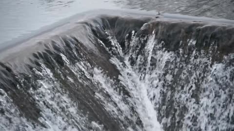 Listen to a milpond waterfall in ontario
