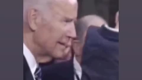 Joe Biden rubs his nose on the back of a 8 year old molesting him