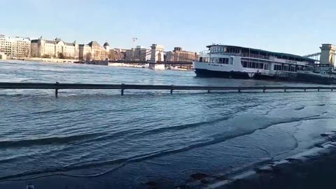 Danube River in Budapest, Hungary floods onto street