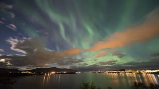 northern lights over the fjord