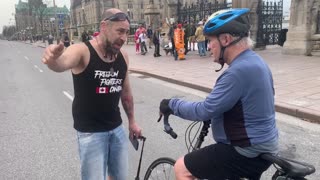 Freedom protester talking to Ottawa resident